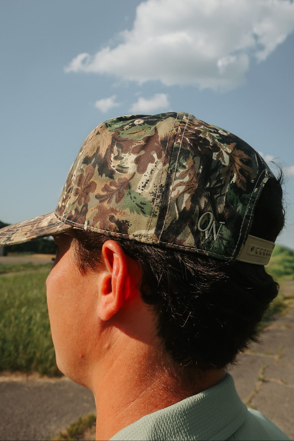 OurWay Camo Trucker Hat —structured trucker cap - subtle OurWay embroidery
