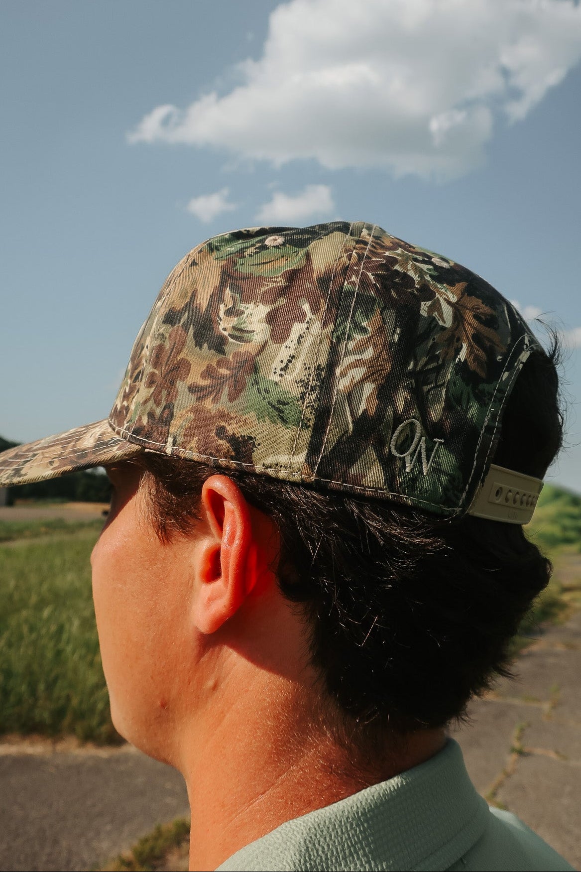 OurWay Camo Trucker Hat —structured trucker cap - subtle OurWay embroidery